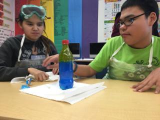 students looking over project completion 